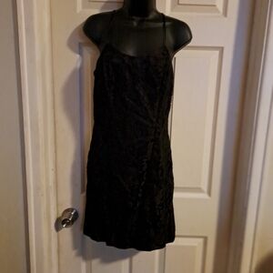 All that jazzy two Piece Dress and jacket outer material is lace.